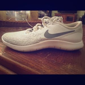 White and gray Nike shoes